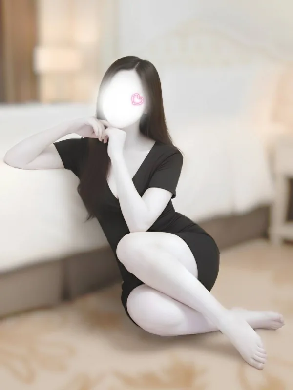 東條 綾