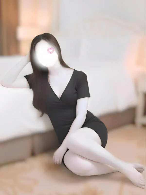 東條 綾