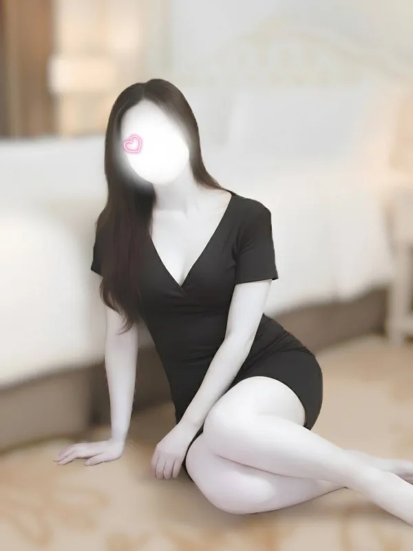 東條 綾